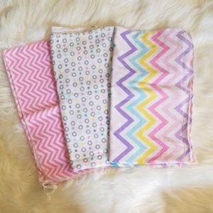 Vibrant baby girl receiving blankets